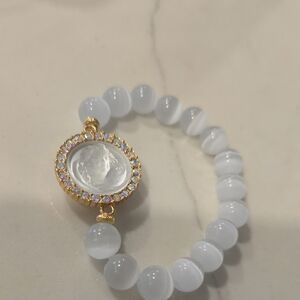 Elegant White Beaded Angel Cameo Bracelet with Gold Accents